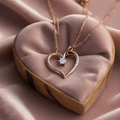 Add a touch of elegance to your jewelry collection with this stunning Rose Gold Moissanite Delicate Dainty Heart Locket Necklace. Featuring a finely crafted heart locket design, this delicate necklace is perfect for everyday wear or as a meaningful gift. The beautiful rose gold finish and sparkling moissanite stone add a luxurious feel, making it a must-have accessory. Whether you're looking for a timeless moissanite necklace, a dainty heart necklace, or a stylish rose gold piece, this heart loc Cubic Zirconia Heart Necklace For Wedding, Elegant Double Heart Cubic Zirconia Necklace, Elegant Clavicle Chain Necklace For Mother's Day, Fine Jewelry Heart Pendant For Wedding, Elegant Heart Charm Jewelry With Cubic Zirconia, Elegant Heart Charm Jewelry In Cubic Zirconia, Elegant Cubic Zirconia Jewelry With Heart Charm, Wedding Necklace With Heart Charm And Cubic Zirconia, Elegant Cubic Zirconia Heart Charm Necklace