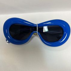 Oval black lens sunglasses White Oval Sunglasses, Luxury Oval Sunglasses With Tinted Lenses, Luxury White Anti-reflective Shield Sunglasses, Elegant Blue Anti-reflective Sunglasses, Sunglasses Oval, Luxury Blue Anti-reflective Shield Sunglasses, Shaped Sunglasses, Mobile Device, Sunglasses