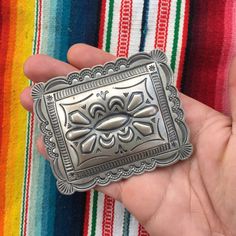 "This piece is a classic rectangular belt buckle with scalloped edges and lovely sterling silverwork. Great gift for an anniversary, birthday or an amazing wedding suit addition for a southwestern vibe. 49 grams for the entire piece 2.4\" long 3\" wide 2\" wide attachment for belt Signed by artist BLKGT and sterling silver hallmark. If you have questions about this item etc please ask before you purchase. Sold as-is, no returns or exchanges on any jewelry. Free domestic shipping Thanks for looki Classic Silver Belt Buckles With Polished Finish, Artisan Engraved Belt Buckles For Gifts, Artisan Engraved Belt Buckles As Gift, Silver Engraved Rectangular Belt Buckles, Classic Silver Buckle Belt Buckles As Gift, Silver Rectangular Engraved Belt Buckles, Rectangular Engraved Silver Belt Buckles, Rectangular Silver Engraved Belt Buckles, Antique Engraved Belt Buckles For Gift