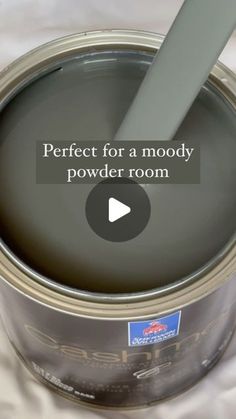 a paint can with the words perfect for a moody powderer room on it