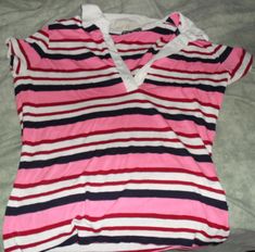 Used stripe shirt. Juniors Size L/Women's size S-M. Clean, comes from smoke/pet free home.