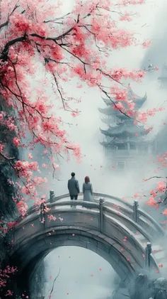 two people standing on a bridge over a river in the middle of a forest filled with pink flowers