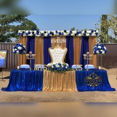 an event set up with blue and gold decorations