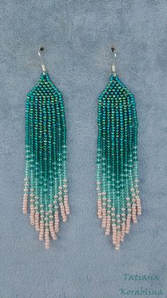 These handmade earrings are made of high-quality Czech beads and strong synthetic thread. They are elegant, fashionable, and highly versatile, suitable for everyday wear. Color: green,mint ,herbal. There may be some color discrepancies which is due to the different monitor settings 100% hand made with love! Measurements: Length-about 11cm (4.33 inch) Width -about 2 cm (0.79 inch) Materials: Sterling silver components Czech glass beads Strong bead weaving thread Green Dangle Tassel Earrings For Summer, Green Fringe Earrings For Summer, Green Tassel Jewelry For Summer, Summer Green Tassel Jewelry, Handmade Green Beaded Dangle Earrings, Handmade Green Dangle Beaded Earrings, Green Handwoven Dangle Beaded Earrings, Green Handwoven Beaded Dangle Earrings, Green Tassel Drop Earrings