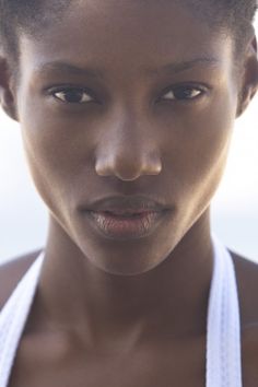 a close up of a person wearing a bathing suit