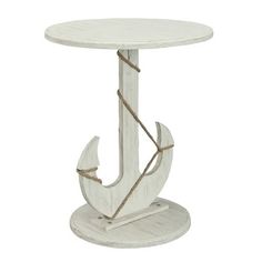 an anchor shaped side table with rope on the bottom and one end in whitewashed wood