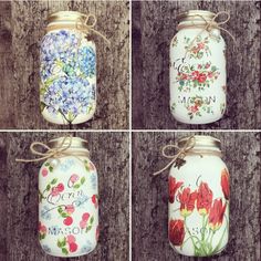 four mason jars with flowers painted on them