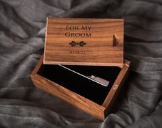 a wooden box with a tie clip in it that says for my groom on the inside