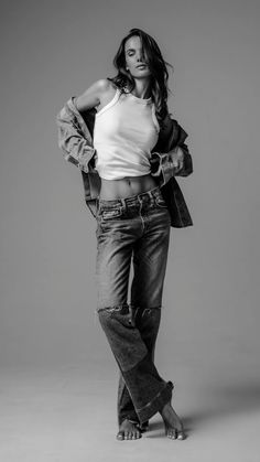 black and white photograph of a woman in jeans