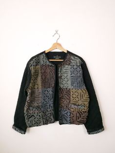 Vintage Sacred Threads Black/Patchwork Quilted Button front Jacket. Measurements Total Length         : 22" Armpit to armpit  : 21" Armpit to end of sleeve : 17 1/2"  Condition              : Gently used. There's no stains or holes. Good condition.  ※Please read the policy before you purchase.※ Bohemian Black Outerwear With Patchwork, Black Bohemian Patchwork Outerwear, Bohemian Black Patchwork Outerwear, Black Nylon Patchwork Outerwear, Luxury Black Patchwork Outerwear, Vintage Hooded Patchwork Outerwear, Black Patchwork Button-up Outerwear, Vintage Brown Patchwork Outerwear, Multicolor Patchwork V-neck Outerwear