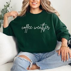 The "Coffee Weather Sweatshirt" is a sturdy and warm sweatshirt bound to keep you warm in the colder months. A pre-shrunk, classic fit sweater made with love for you & your loved ones! Sweatshirt Details: * Gildan sweatshirt - unisex fit * 50% cotton, 50% polyester * Pre-shrunk * Classic fit with no center crease * 1x1 athletic rib knit collar with spandex * Air-jet spun yarn with a soft feel and reduced pilling * Double-needle stitched collar, shoulders, armholes, cuffs, and hem * Model is wearing a size L *If you'd like an oversized fit please order 1-2 sizes larger than your normal size. For any sizing recommendations please message us :) Care Instructions For More Durability: * Do not iron directly on graphic * Do not dry clean * Machine wash cold with mild detergent * Turn inside out Coffee Long-sleeve Sweatshirt For Winter, Cozy Letter Print Sweater For Everyday, Cozy Fall Sweatshirt Gift, Coffee Crew Neck Sweatshirt For Winter, Coffee Colored Crew Neck Sweatshirt For Winter, Winter Coffee-colored Crew Neck Sweatshirt, Coffee Color Crew Neck Sweatshirt For Winter, Cozy Sweatshirt For Fall Gift, Casual Coffee-colored Winter Sweatshirt