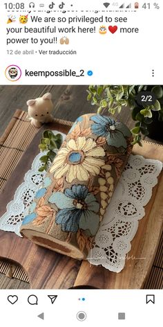 a wooden tray with a pillow on top of it