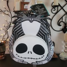 Loungefly Disney Nightmare Before Christmas Headless Jack Skellington Mini Double Shoulder Strap Backpack Purse, Nwt. Officially Licensed Disney Faux Leather Featuring Front Zipper Pocket, Inside Zipper Pocket, Full Zippered Top, Adjustable Shoulder Straps, Top Carry Handle And Printed Inside Lining. Approx Measurements 9" W X 10.5" H X 4.5" D, Straps Will Vary As They Are Adjustable. Themed White Backpack For Everyday Use, White Backpack For Halloween, White Halloween Backpack For Travel, Halloween White Backpack, White Halloween-themed Travel Backpack, White Halloween Backpack, Nightmare Before Christmas Wallpaper, Disney Nightmare Before Christmas, Disney Bags