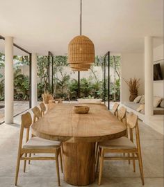 a dining room table with chairs around it