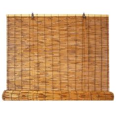 a bamboo mat hanging from the side of a wall with two hooks on it's end