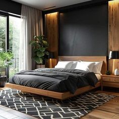 a large bed sitting next to a window on top of a hard wood flooring