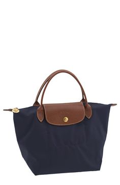 Longchamp 'Le Pliage - Mini' Tote available at #Nordstrom Classic Everyday Packable Bag, Navy Shoulder Bag With Double Handle For Travel, Navy Double Handle Shoulder Bag For Travel, Versatile Shoulder Bag With Snap Closure For Travel, Classic Nylon Bag With Removable Pouch, Classic Bags With Snap Closure For On-the-go, Coated Canvas Travel Bag With Flap, Navy Top Handle Shoulder Bag For Travel, Navy Travel Bag With Detachable Handle