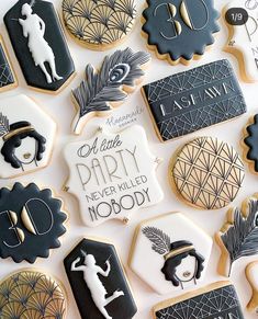 decorated cookies with black and white designs on them