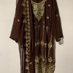 Brown And Gold Embroidered On Georgette Cloth, Dupatta With Border, And Plain Trouser Pants 3 Piece Brand New, Never Worn Measurements (One Side): Armpit To Armpit- Almost 22 In Waist- Almost 21 In Hip -25 In Sleeves- 21 In Length - 45 In Pakistani Suits, Trouser Pants, Salwar Kameez, Brown Gold, Trousers, Brand New, Pants, Women Shopping, Clothes