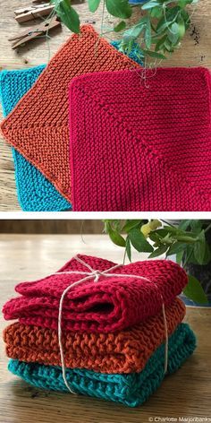 crocheted dishcloths are stacked on top of each other and one is red, the other blue