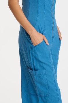 Calling all linen lovers! Now in breezy Cotton Linen, NorrisÕ clean, cropped silhouette is back with a zip-up flare, along with ring-snap cargo pockets and an elastic cinched back waist for a flattering look. Cotton Linen: 55/45 Linen/Cotton. 2x1 Rib Contrast: 95/5 Cotton/Spandex Inseam: ~21.75" Color Description: Vibrant saturated pool blue Preshrunk Machine washable Imported MODEL Angelica is wearing size Small. Height: 5'10" | Bust: 32B | Waist: 25" | Hip: 37" Ring Snap, Pool Blue, How To Make Shorts, Petite Size, Bra Sizes, Zip Up, Cotton Spandex, Cotton Linen, Zip Ups