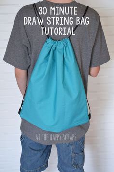 a young boy wearing a drawsack bag with the words 30 minute draw string bag