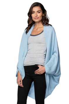 The Nessa Wrap is a classic cashmere piece in our cozy washable cashmere. It is the perfect layering piece when you're cold. With a loose and easy fit, this is a staple for your closet. Loose & Easy 100% California Cashmere Machine Washable | Set your washing machine to the delicate cycle, which is designed to be gentle on fabrics. Make sure the water temperature is set to "cold." Other option is Hand Wash, Cold or Dry Clean Imported