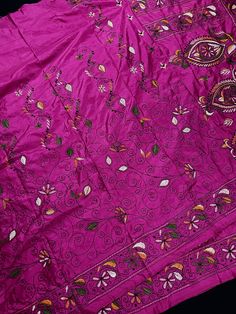 Gorgeous Wine color saree with handwoven Kantha stitch work Item: SareeColor : Fuchsia Pink Color with Multi Color Thread Base Fabric: Bangalori Silk Blouse piece : YesBlouse material: Bangalori Silk Fall & Edging (Yes/No) : Yes Disclaimer -:- Color variation is possible due to various reasons like phone or desktop setting, resolution etc. Please don't hold us responsible. Our aim is to put the exact color of the Saree.- Colors are very Subjective. Hence a color understood by us can be different Pink Chanderi Choli With Motifs, Pink Silk Choli With Motifs, Pink Bollywood Lehenga For Festival, Pink Art Silk Choli With Motifs, Bohemian Embroidered Pink Salwar Kameez, Bohemian Pink Salwar Kameez With Resham Embroidery, Bohemian Pink Lehenga With Zari Work, Semi-stitched Bohemian Pink Saree, Pink Bohemian Traditional Wear With Resham Embroidery