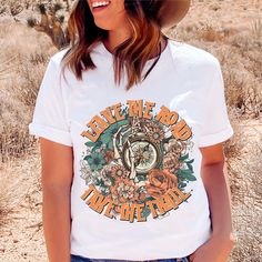 a woman wearing a white t - shirt that says eat the road, live the ride