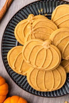 Overhead shot of pumpkin cut out sugar cookies on a black plate Easy Thanksgiving Cookies, Fun Cookie Recipes, Pumpkin Cheesecake Cookies, Cut Out Sugar Cookies, Fall Cookie Recipes, Cookie Glaze, Pumpkin Cravings, Chewy Gingerbread Cookies