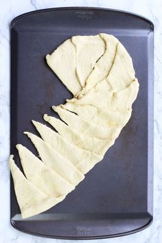 sliced tortilla bread on a baking sheet