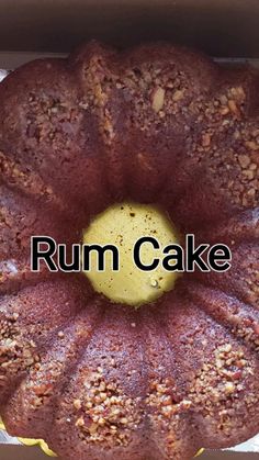 a bundt cake in a box with the words rum cake above it