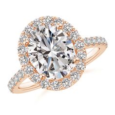 a rose gold engagement ring with an oval center surrounded by round diamonds