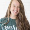 a girl with long hair smiling for the camera and wearing a t - shirt that says year