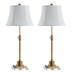 pair of brass table lamps with white shades