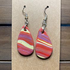 100% clay, all original, and one of a kind! I have been exploring clay and am starting to love it. This blend is inspired by Iowa State. Go Cyclones! Get both pairs for you and another. Such beauty! *earrings sold separately Yellow Clay Earrings, Earrings Quotes, Marble Earrings, Red Boho, Christmas Accessories, Rainbow Earrings, Classy Jewelry, Iowa State, Design Earrings