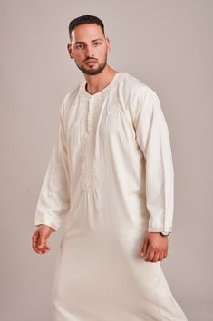 Men Jubbah Thobe Full Sleeves Our classic garments are designed with subtle element of contemporary elegance. Any Queries: If you have any queries please do not hesitate to contact us. Colours: Colours may slightly vary due to different display setting. Postage: We aim to dispatch the goods within 24 hours Monday to Friday. All of our items are posted by Evri. White Long Sleeve Transitional Kaftan, White Thobe With Traditional Patterns For Eid, Traditional Festive Thobe With Chikankari Embroidery, Festive Traditional Thobe With Chikankari Embroidery, Eid Tunic Kurta For Traditional Ceremonies, Eid Traditional Tunic Kurta, Cream Long Sleeve Thobe For Eid, Long Sleeve Cream Thobe For Eid, Kaftan Style