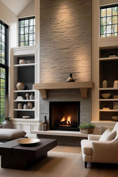 a living room filled with furniture and a fire place in the middle of a room