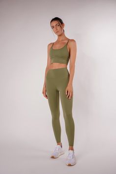 Top and bottom sold separately. Buttery soft activewear set in army green. Comfortable and stretchy fabric, with a light/medium support. Whether it's leg day at the gym or heading to a yoga and barre class, these will be your go-to workout set. Buttery soft fabric High stretch and body-shaping Slim fit Removable bra pads included Tailor to your size with the adjustable criss cross strings Great for yoga but also a cute and sexy going out top Fabric 81% Nylon, 19% Spandex Anti-pilling fabric Wash Gym Class Outfits, Green Workout Set, Leg Day At The Gym, Class Outfits, Green Activewear, 12 Minute Workout, Lose Thigh Fat, Tone Thighs, Barre Classes