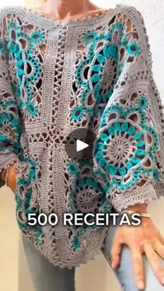 a woman wearing a crocheted sweater with the words 500 receitas written on it