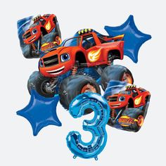 the number three balloons are decorated with monster trucks