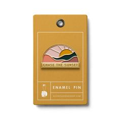 enamel pin badge with the words chase the sunset on it