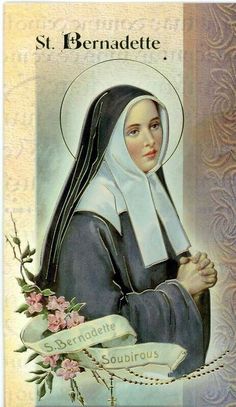 a painting of the mother of god with flowers and ribbon around her neck is hanging on a wall