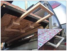 the back end of a truck with wood pieces attached to it