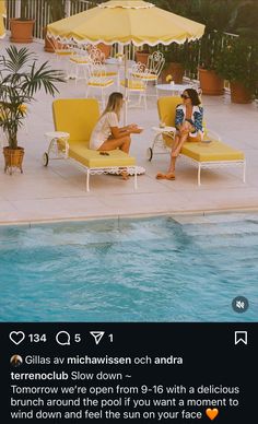 two women sitting on lawn chairs next to a swimming pool