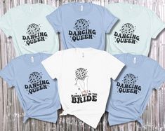 four t - shirts with the words dancing queen on them in black, white and blue