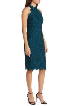 Exquisite and enchanting, this all-lace dress is styled to showcase your shoulders and herald many special nights out. 41" center front length (size 8) Mock neck Lined 43% nylon, 29% cotton, 28% rayon Dry clean Imported Fitted Lace Sheath Dress, Fitted Sheath Lace Dress With Scalloped Lace, Formal Lace Dress With Scalloped Lace And Fitted Bodice, Fitted Delicate Lace Dress For Formal Occasions, Formal Lace Dress With Scalloped Lace, Formal Lace Dress With Scalloped Detail, Sheath Lace Dress, Fitted Bodice Knee-length Lace Dress, Evening Sheath Dress With Scalloped Lace