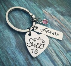 a keychain with an engraved heart and name on the front that says, ann's sweet sixteen