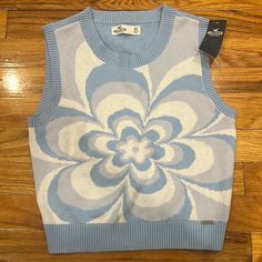 Never Worn New With Tags Fall Floral Print Light Blue Top, Fall Light Blue Floral Print Top, Winter Blue Floral Print Tops, Blue Floral Print Top For Winter, Blue Floral Print Tops For Winter, Retro Blue Floral Print Tops, White Cropped Sweater, Hollister Sweatshirt, Hollister Cardigan