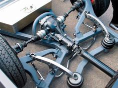 the front wheels and suspensions of a race car